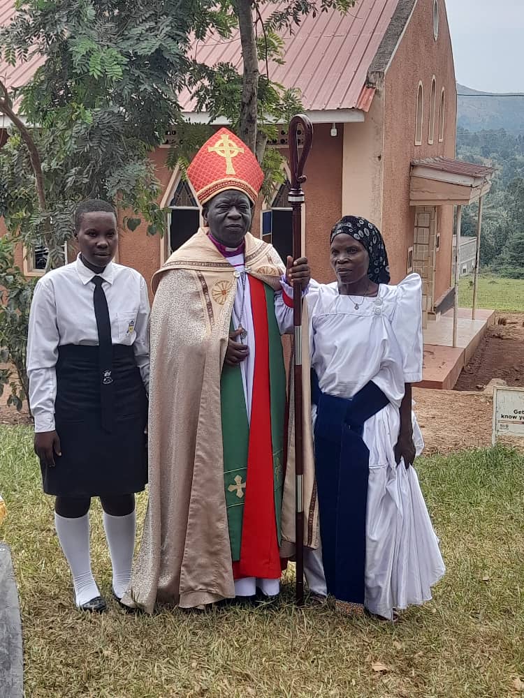 Nakwaya Secondary School community members with a church leader